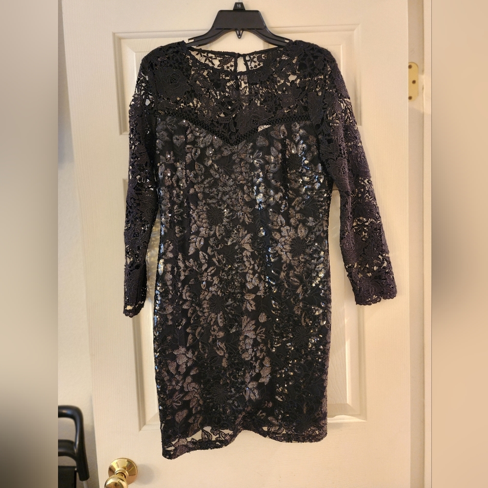 Black above the knee sequin dress. Size Med.